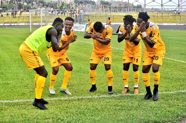 Ashantigold S.C players celebrating after a goal