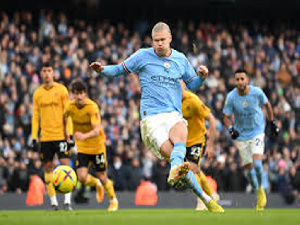 City scored in stoppage time to clinch a come-from-behind 2-1 win at Wolverhampton Wanderers