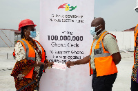 Senyo Hosi receiving the cheque on behalf of the Ghana COVID-19 Private Sector Fund