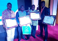 Team weightlifting pose for the cameras after winning an unprecedented five awards at the 42nd MTN-