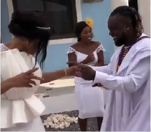 Eddie Nartey and his wife dancing