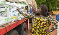 Upper East Regional Minister inspecting the smuggled fertilizer