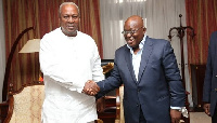 Former President John Mahama shaking hands with President Nana Akufo-Addo