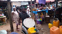 Tutu Kojo Angmor going about his regular hassle in the market