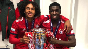 Kwesi Okyere Wreidt with a teammate