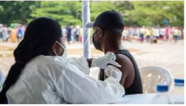 A citizen taking his injection