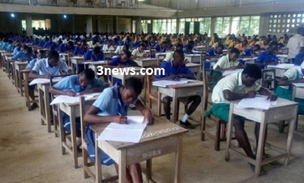 Some pupils taking part in the examination in the Central region