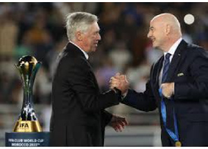 Gianni Infantino (R) and Carlo Ancelotti