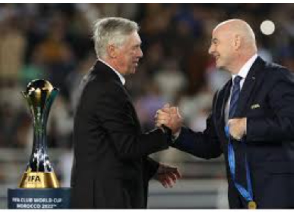 Gianni Infantino (R) and Carlo Ancelotti