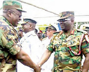 Former President John Mahama exchanges pleasantries with Major General Sampson Adeti