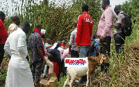 File photo, some persons invoking curses by a riverside