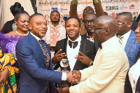 Rev Owusu Bempah [left] receiving his plaque