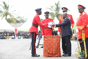 President Akufo-Addo presenting the Sword of Honour to Senior Under Officer Arthur Barnes