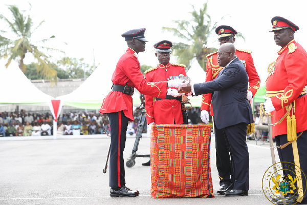 President Akufo-Addo presenting the Sword of Honour to Senior Under Officer Arthur Barnes