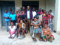 MCE for Ketu North Anthony Avorgbedor with some of the beneficiaries