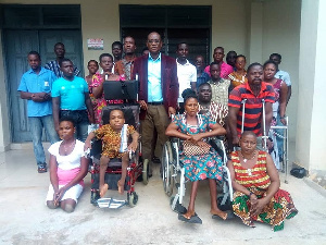 MCE for Ketu North Anthony Avorgbedor with some of the beneficiaries