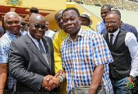 DK Poison in a handshake with President Akufo-Addo