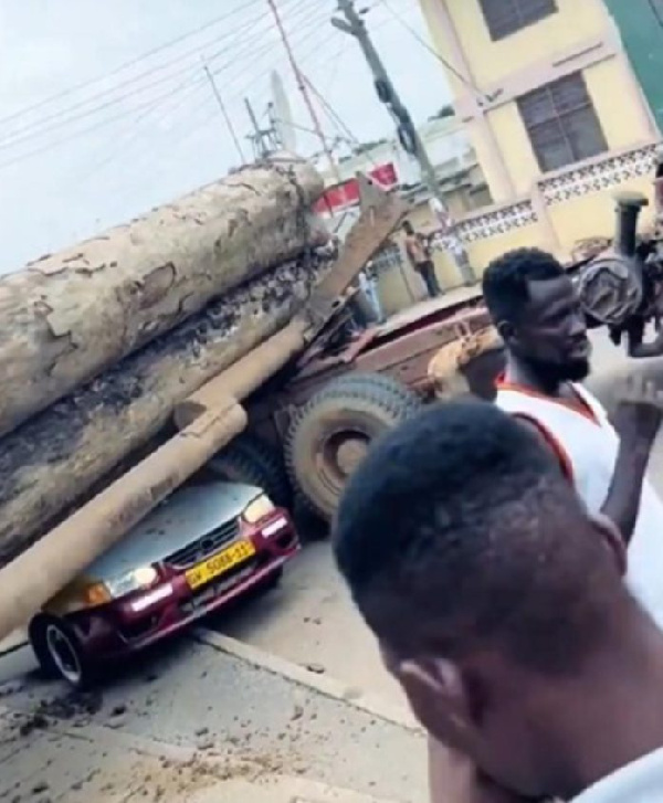 Timber from the truck fell and crushed multiple cars