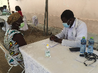 A resident of Mampong-Akuapem undergoing health screening