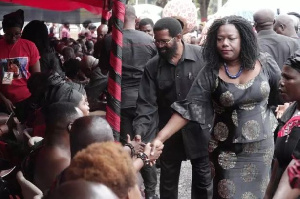 Nana Oye Lithur and Alfred Okoe Vanderpuije greeting members on Ebony's family