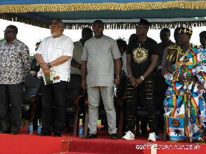 Asamoah Gyan, Rawlings and Isaac Asiamah at the Commissioning of the pitch