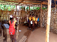 A photo of students in the bamboo classroom