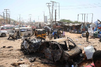 A general view shows the scene of a car bomb explosion at a checkpoint in Mogadishu, Somalia