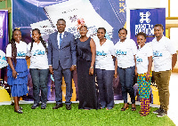 Elder Samuel Danso Adjarquah, author of the book, flanked by some people at the launch