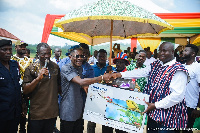 Shatta Wale [L] making a presentation