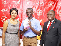 Deputy Minister of Education, Barbara Ayisi Acher with the winner of the UBA Foundation competition