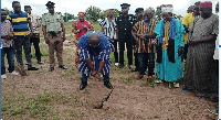 Hon. Edward Owusu cutting the sod