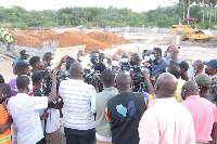 Committee members at the projects site at  Asaakae in the Effia Kwesimintsim Municipality