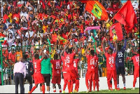 Asante Kotoko players celebrates with their supporters