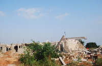 The demolished mosque and other affected structures