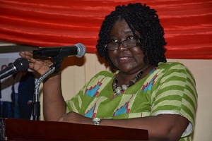 Prof. Rose E.M. Entsua-Mensah(inset) speaking at the lecture. Photo. Vincent Dzatse