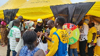 MTN staff interacting with customers in the market