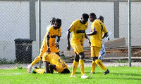 Medeama SC players celebrate their victory