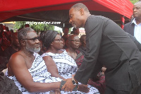 Lawrence Tetteh greeting Ebony's parents at the memorial