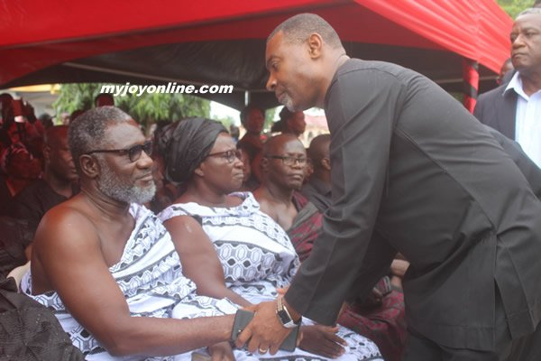 Lawrence Tetteh greeting Ebony's parents at the memorial