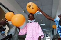 Landry Nion, 9, plays balloons with other hospitalized children while waiting for his surgery