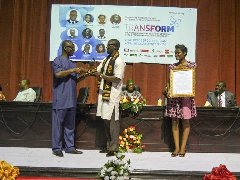 Nana Kwame Bediako receiving his award from the Minister of Youth and Sports Mustapha Ahmed