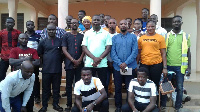 Dr Boako poses with NPP Supporters Association in Ahafo