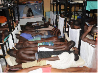 Prisoners jostle for space on the floor in their cells just to catch some sleep