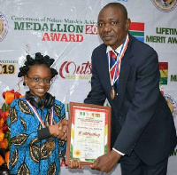 DJ Zel receiving certificate of honour