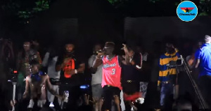 Shatta Wale and his team on stage