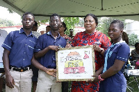 First Lady being presented with an artwork