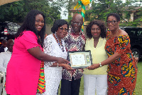 Dr and Mrs Wemah, receiving a citation in recognition of their support to the school.