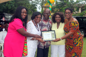 Dr and Mrs Wemah, receiving a citation in recognition of their support to the school.