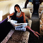 A woman in a private jet