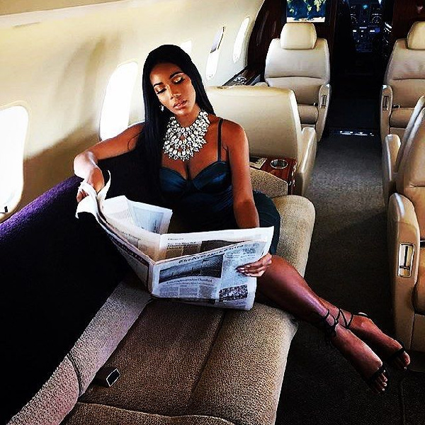 A woman in a private jet